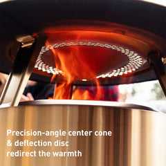 Solo Stove deflector placed on fire pit radiating wider heat for guests