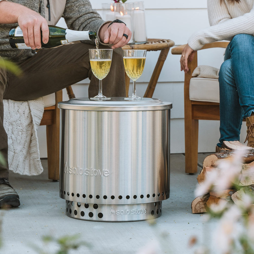 Solo Stove Ranger Lid on patio with furniture highlighting style and entertaining use