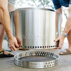 Solo Stove Yukon Stand in use on deck with fire pit protecting deck from heat