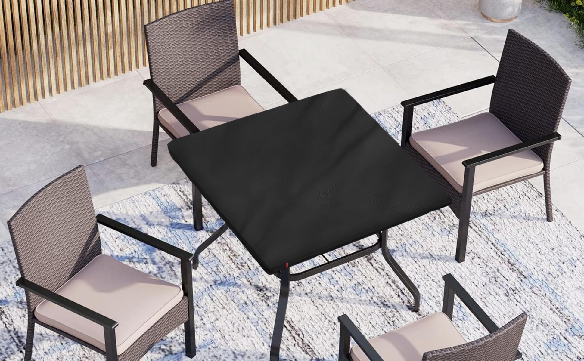 SoloToo buckle straps fastened under table securing cover in place