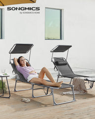 SONGMICS folded sun lounger compact profile with carry handle for easy transport