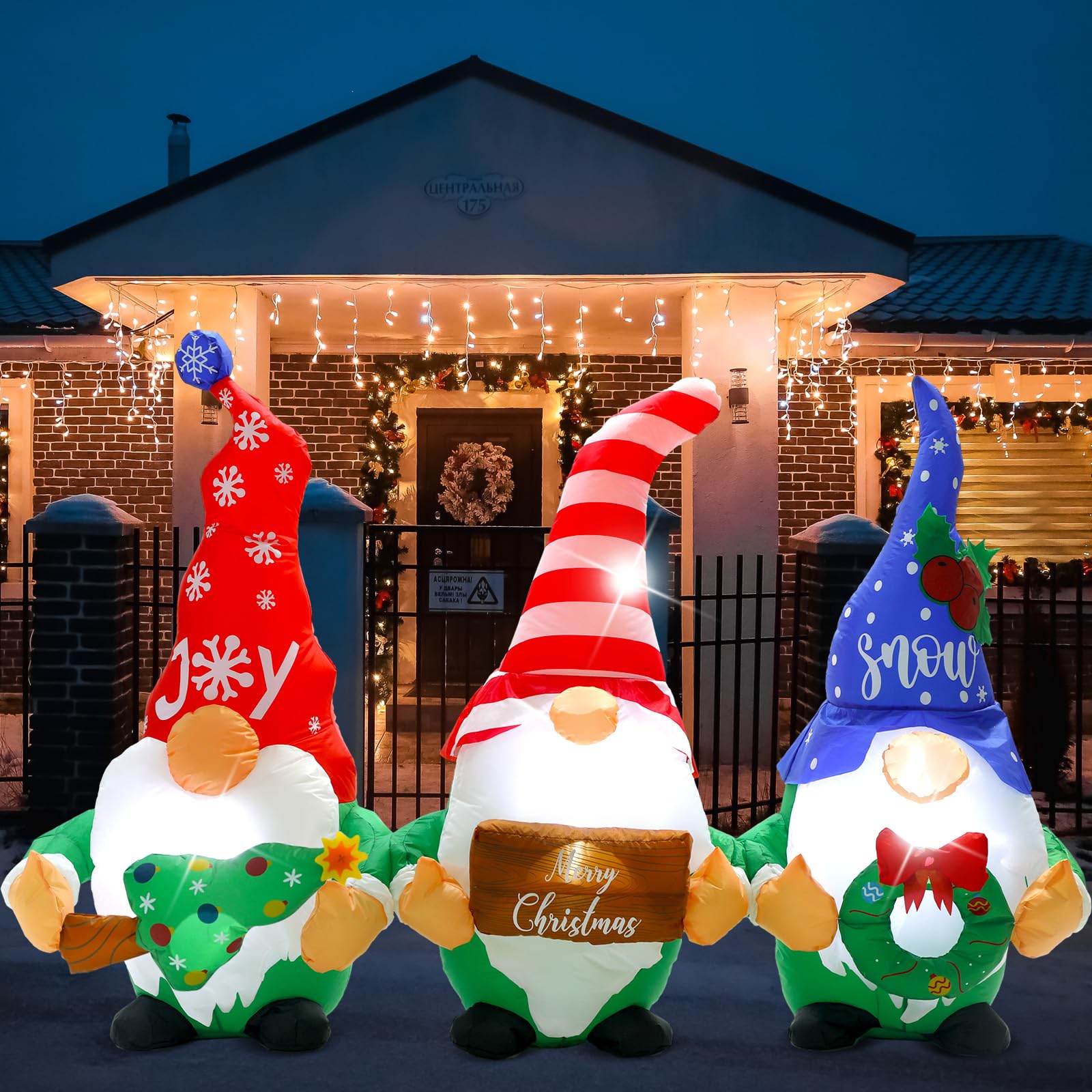 Sosation gnome secured on lawn with stakes and ropes for stable outdoor display
