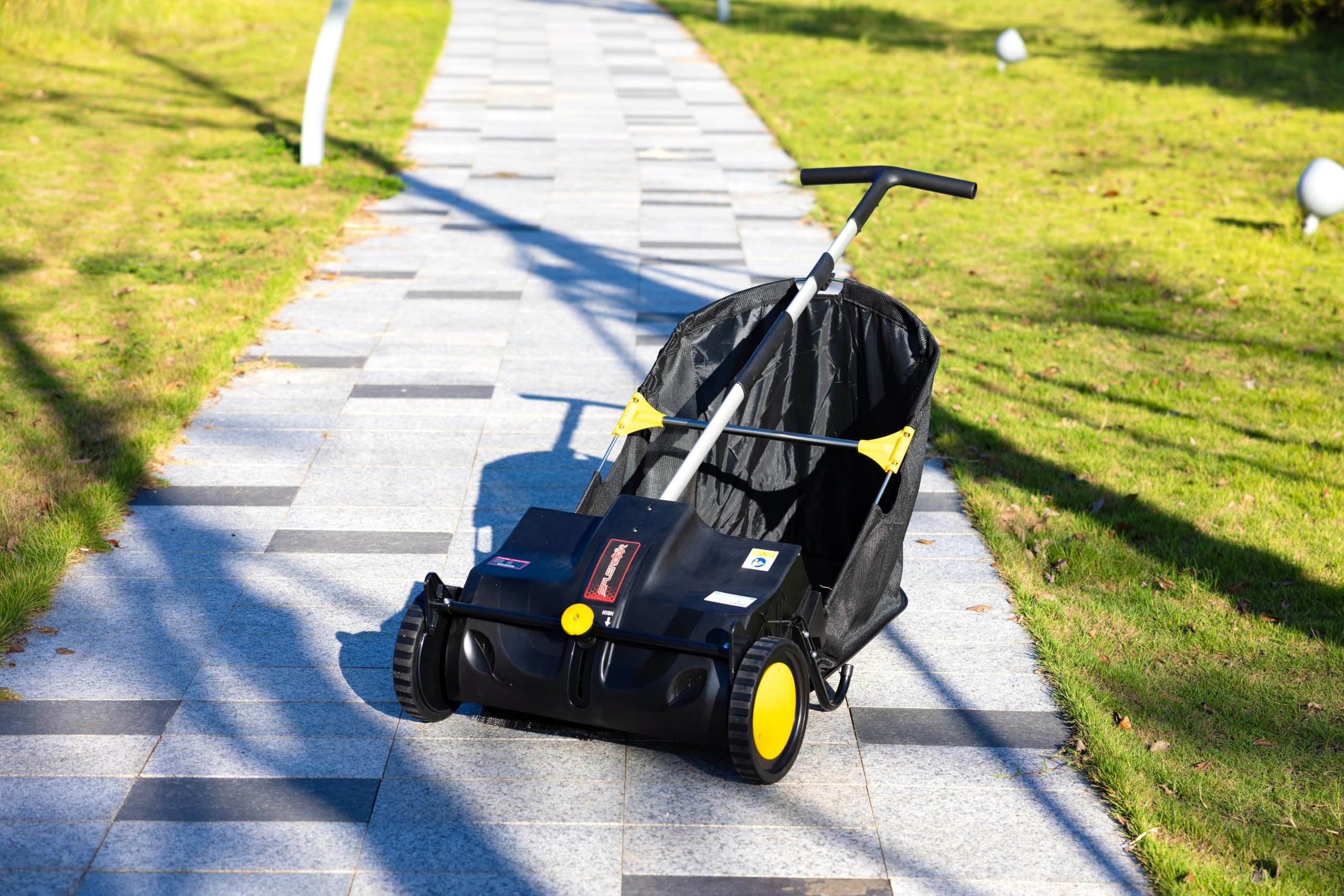 SPLENDOR sweeper in a garden setting highlighting practical yard use