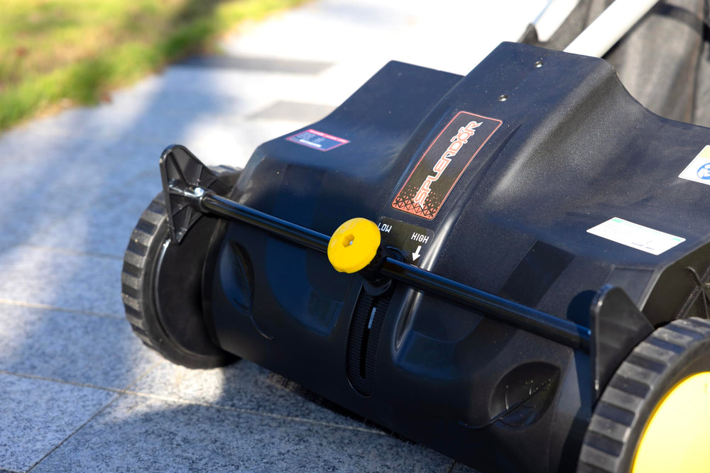 SPLENDOR sweeper in use on grass for faster cleanup benefit