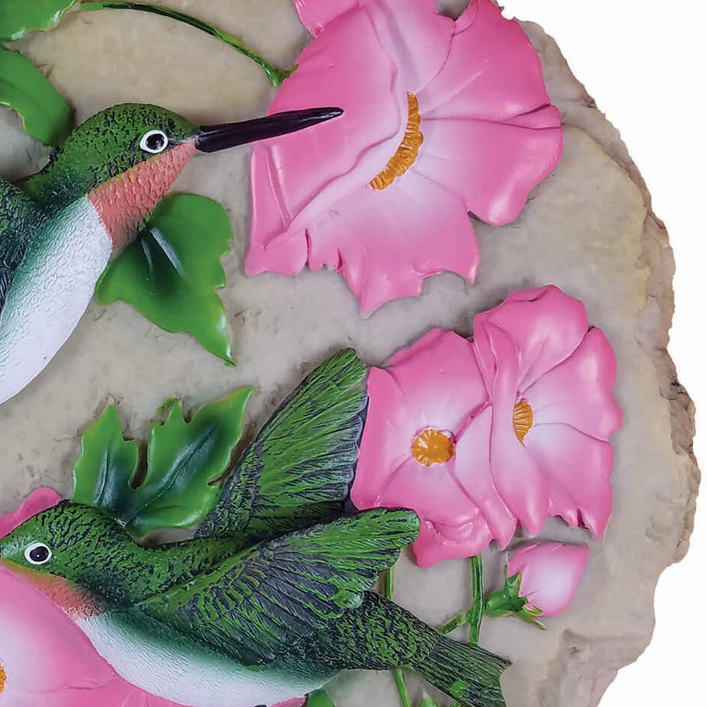 Spoontiques hummingbird in garden among flowers adding cheerful color