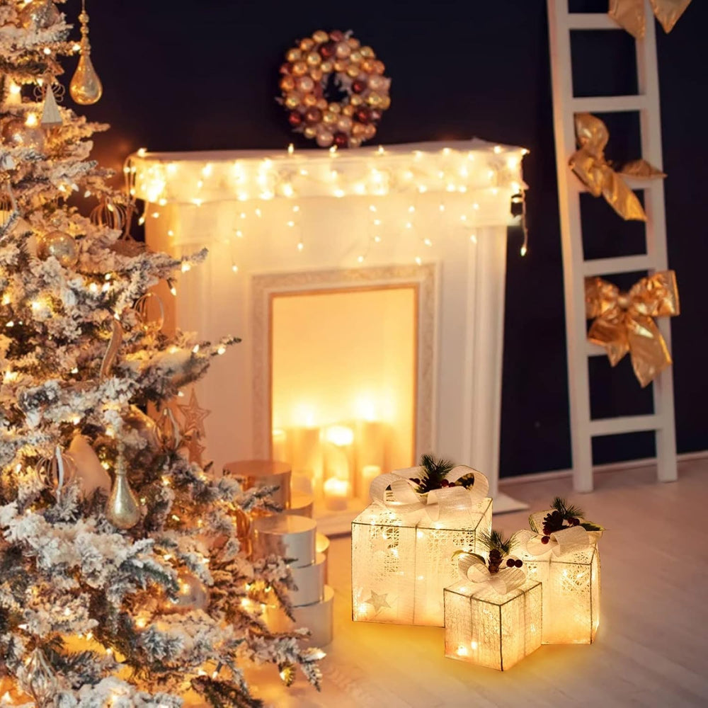 SPRKLINLIN lighted boxes on mantel display, adds layered holiday warmth