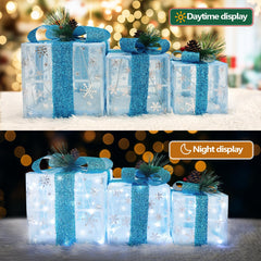 SPRKLINLIN lit boxes on a mantel adding warm ambient holiday light