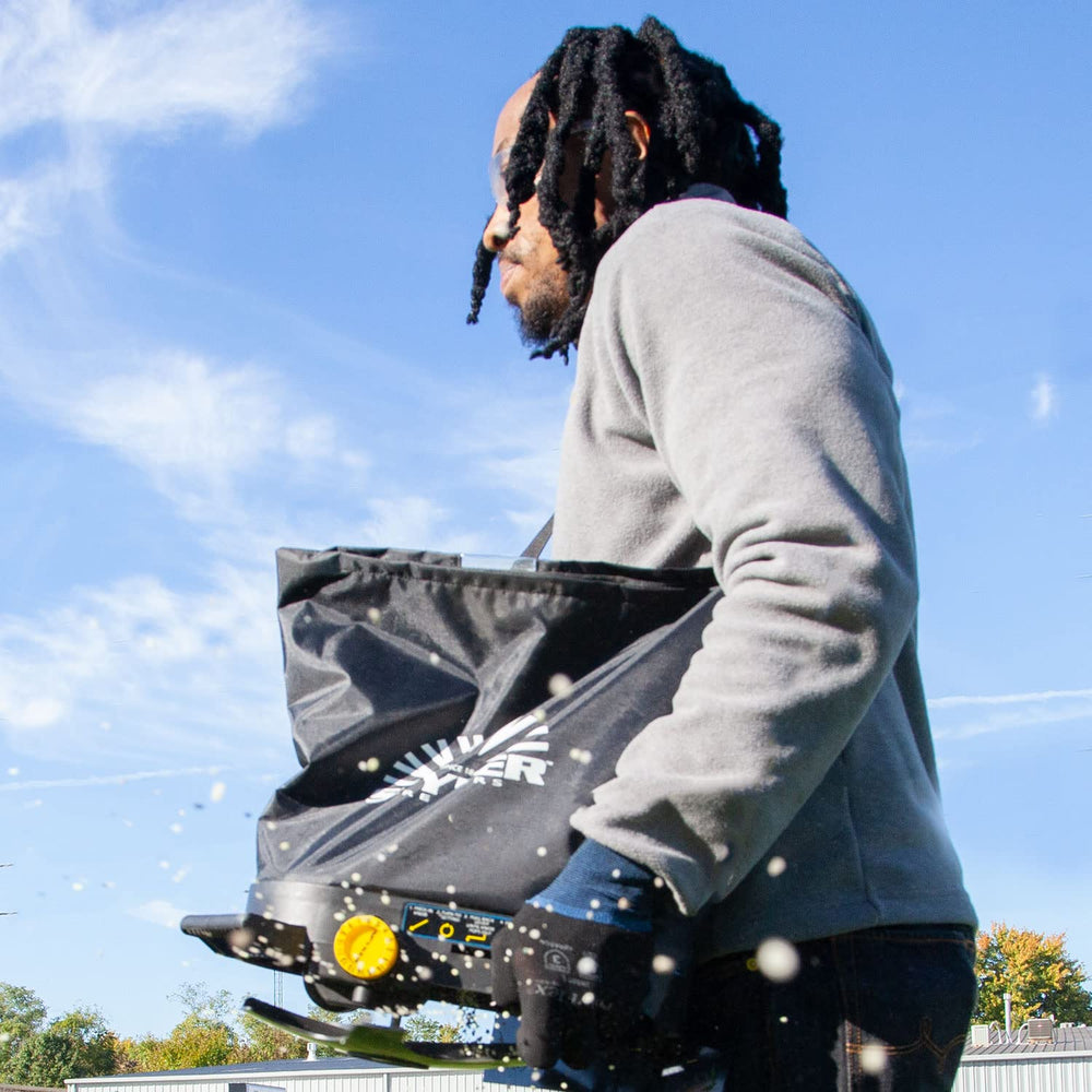 Spyker extra-wide padded shoulder strap in use for comfortable long-duration spreading