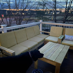 Sqodok cover fitted on wicker patio sofa illustrating weather-ready updated look benefit