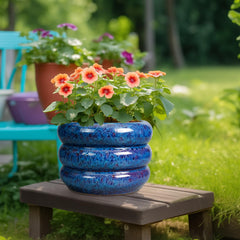 SQOWL pot with plant in living room showing decorative, space-saving benefit