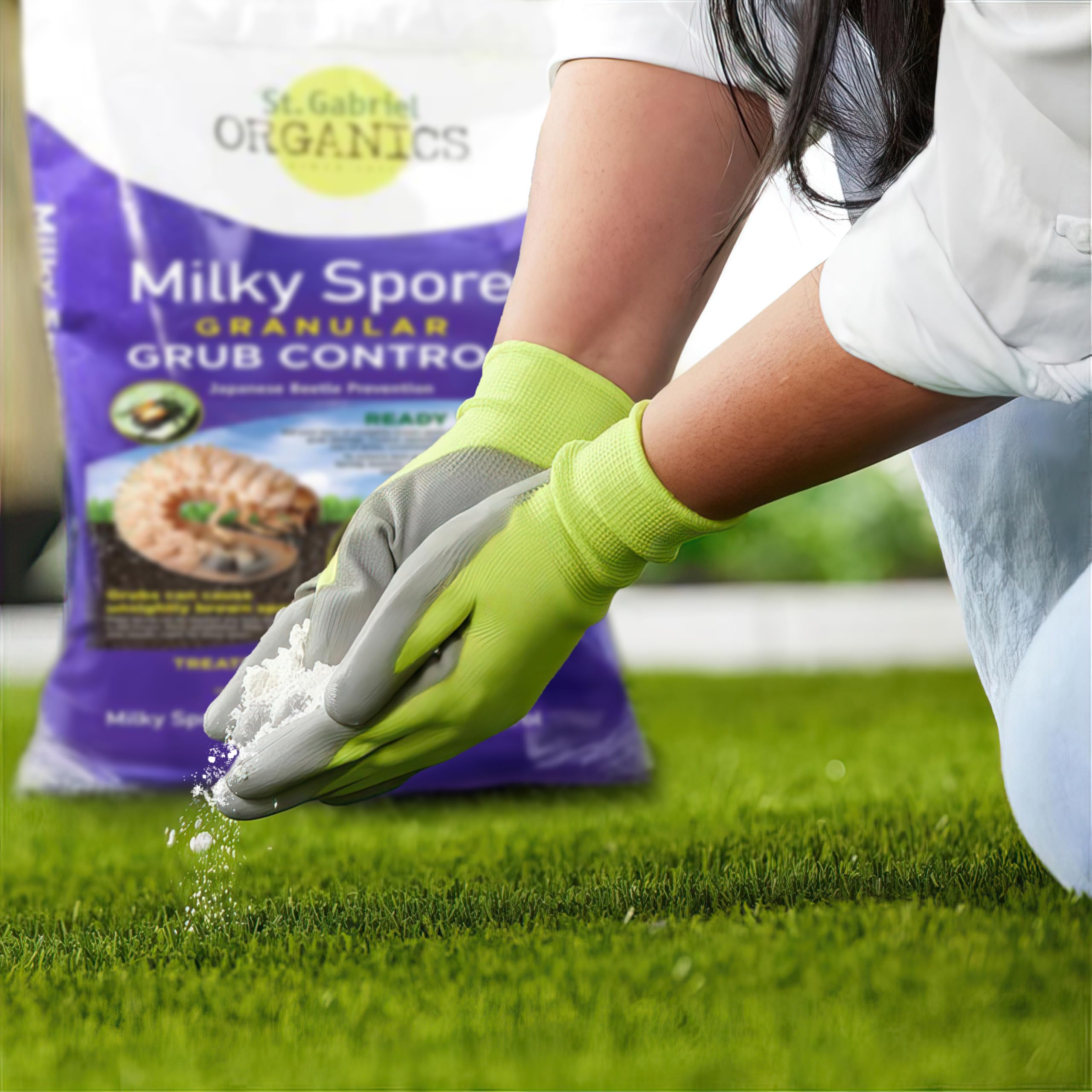 St. Gabriel Organics hands applying granules showing simple DIY use