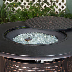 Stanbroil beads in a lit fire pit reflecting flames for brighter visual effect