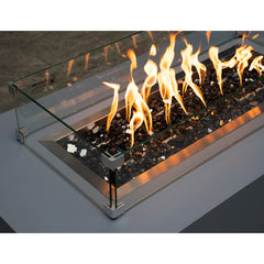 Stanbroil glass in fire pit during installation illustrating proper coverage benefit