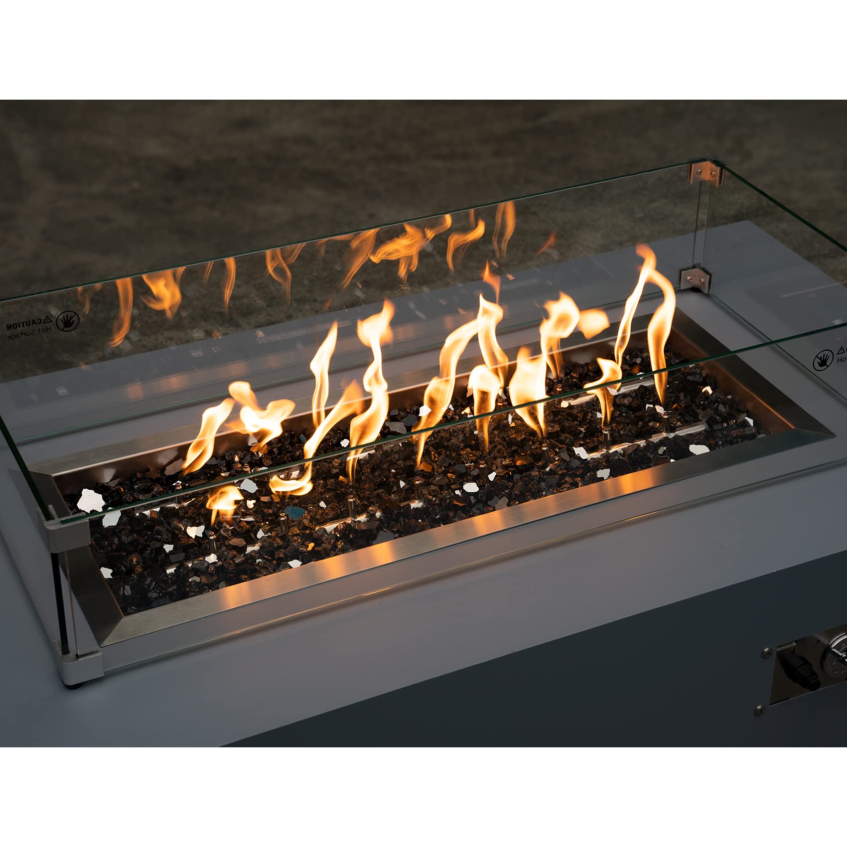 Stanbroil glass in fireplace bowl at dusk showing modern ambiance benefit