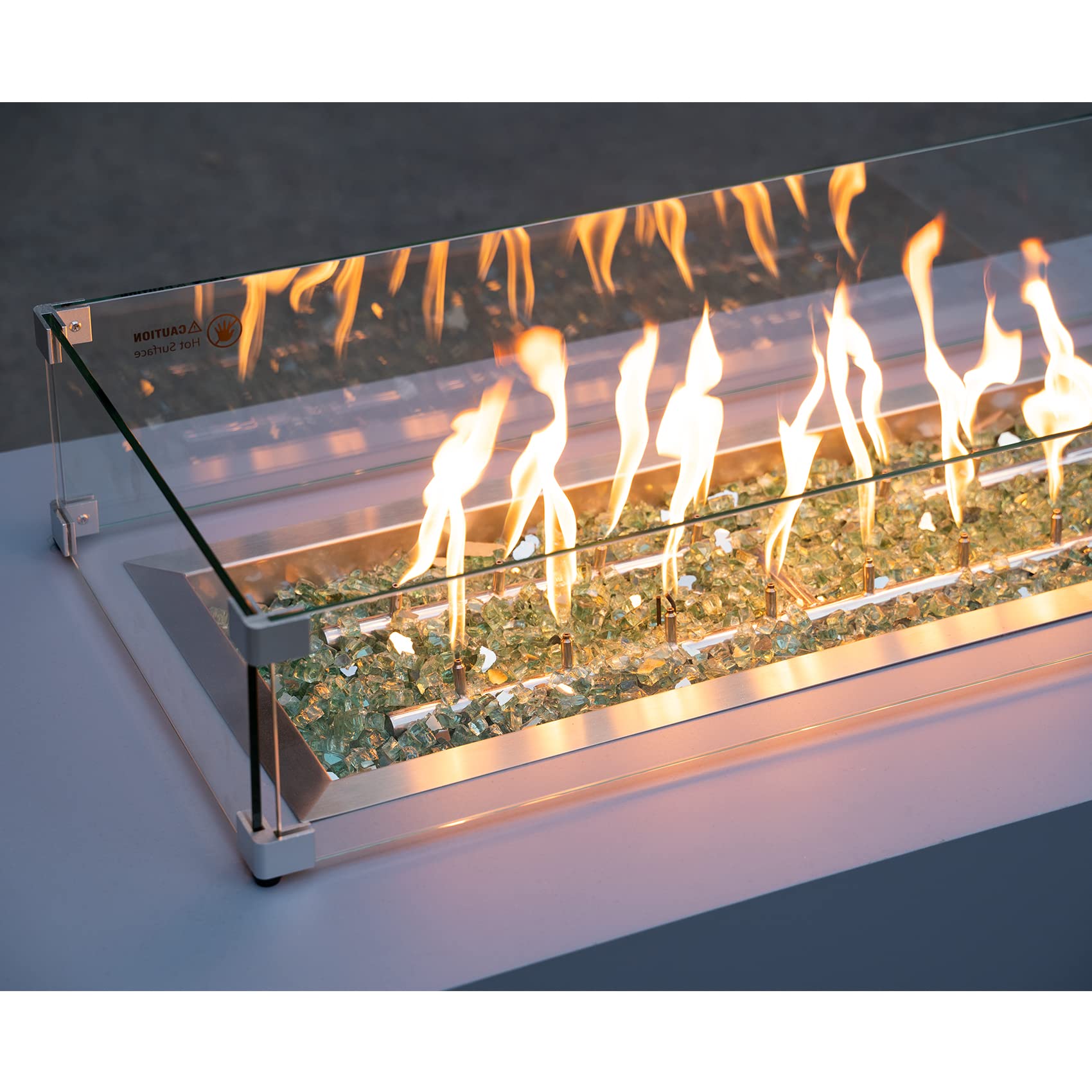 stanbroil fireplace with light green glass creating jewel-like reflections and enhanced ambiance