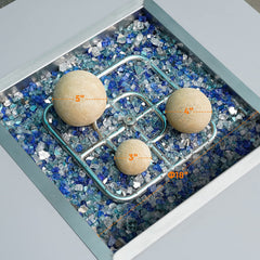 Stanbroil ceramic balls in a gas fire pit with even flames showing improved flame distribution