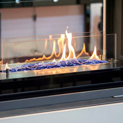 Stanbroil installed in a gas fire pit producing bright reflective flames and upgraded curb appeal