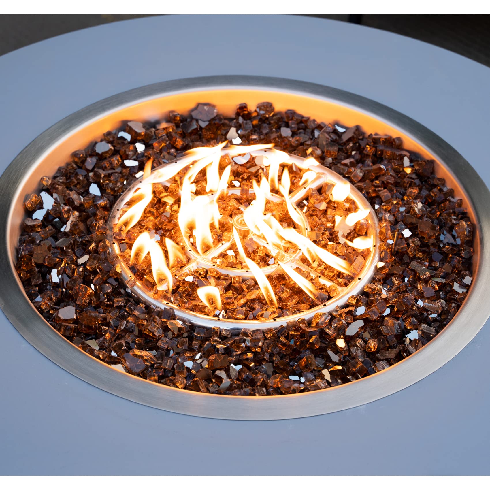 Stanbroil reflective glass under flame demonstrating enhanced light and visual sparkle