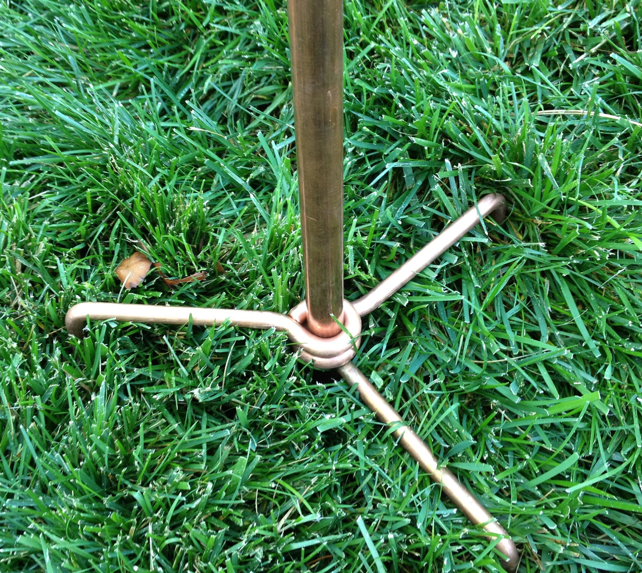 Stanwood Wind Sculpture scale beside garden plants showing 6 ft height impact