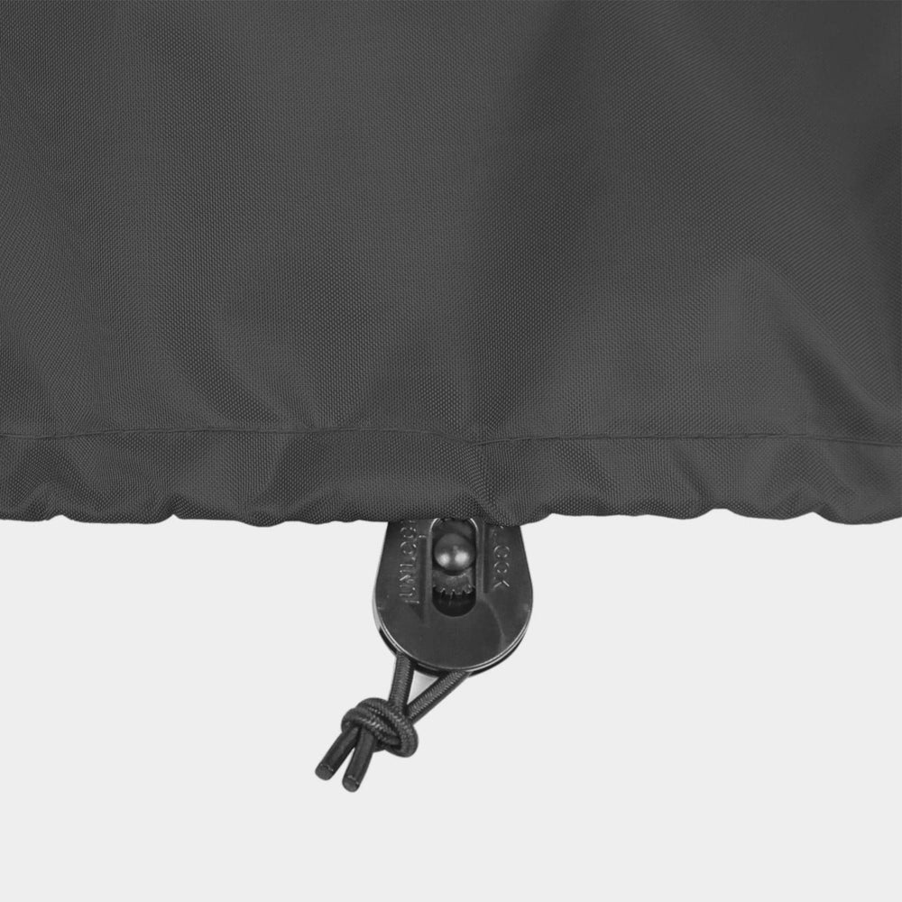 STEECA cover on outdoor deck box in lifestyle setting protecting furniture from elements