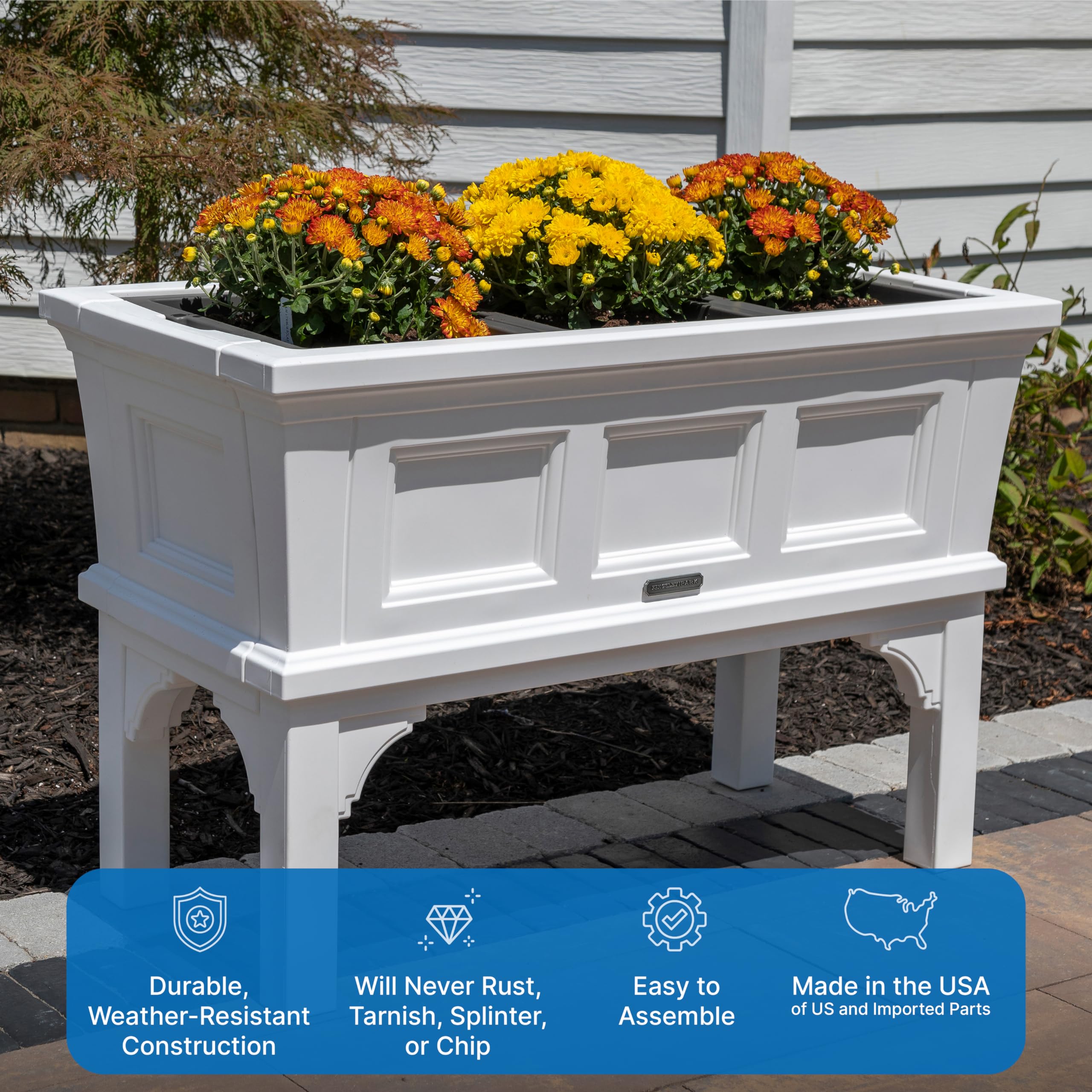 Step2 planter next to chair showing scale and space for many plants benefit