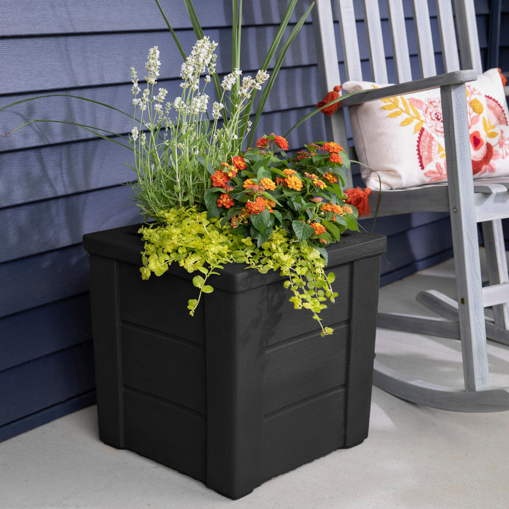 Step2 planter in use on porch with flowers, enhancing curb appeal and easy display benefit