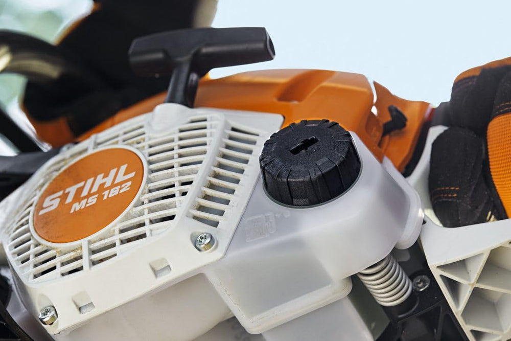 Stihl MS 162 in yard cleanup illustrating practical home-property use