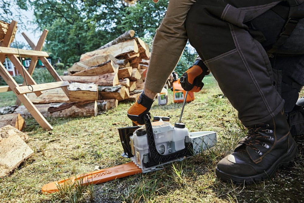 Stihl MS 162 held to show size and weight for comfortable handling