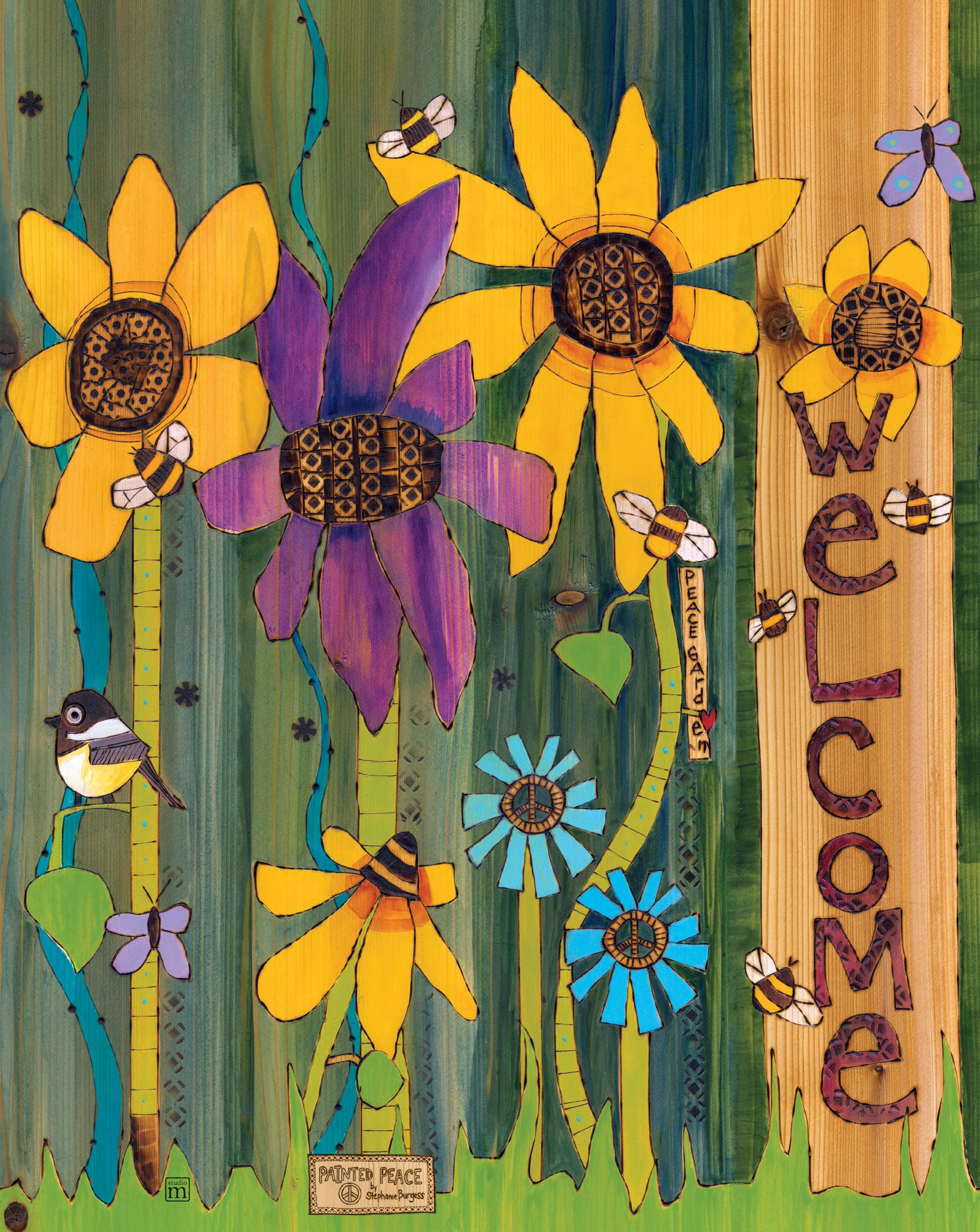 Studio M art pole installed in a garden adding instant color and landscaped charm