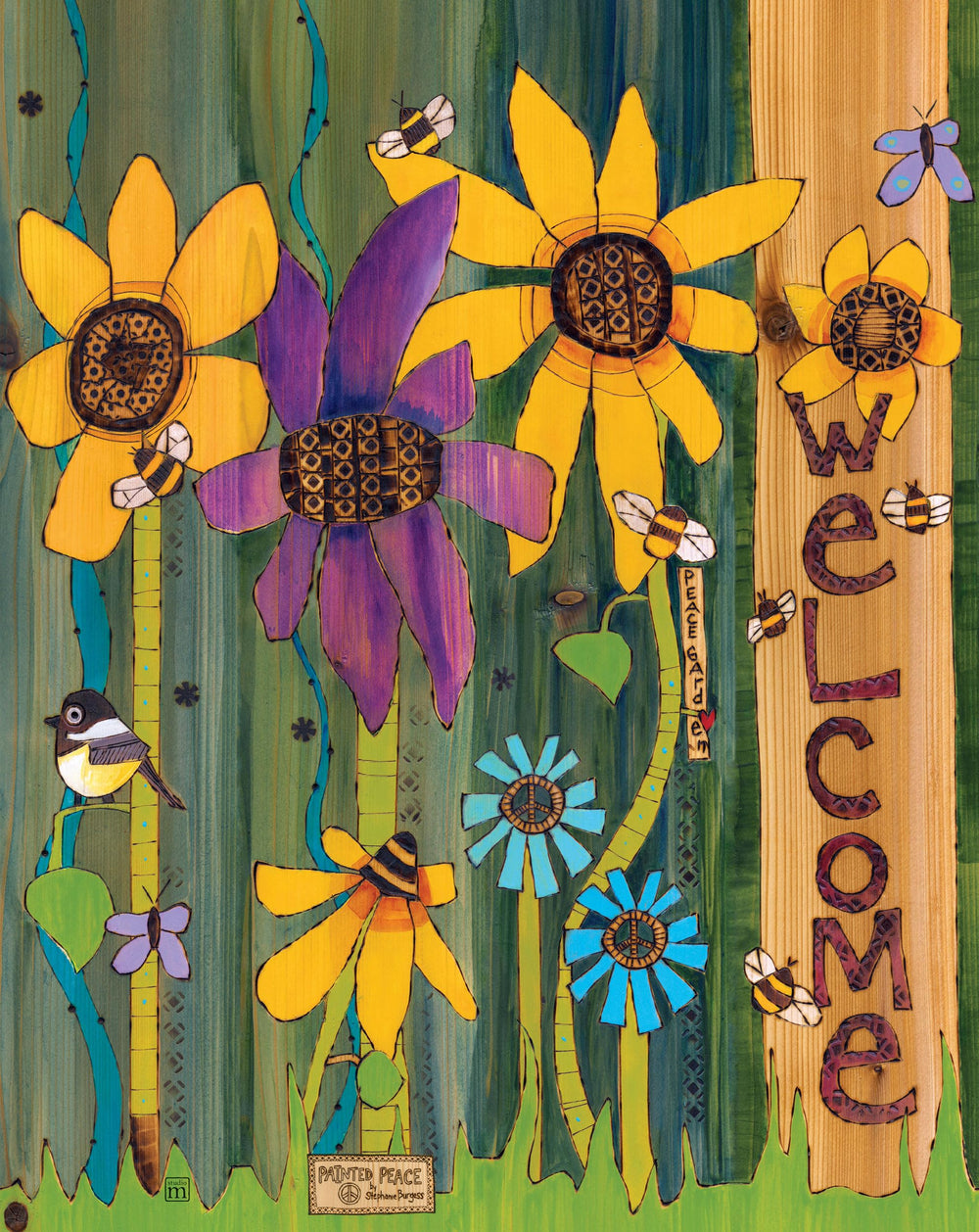 Studio M art pole installed in a garden adding instant color and landscaped charm
