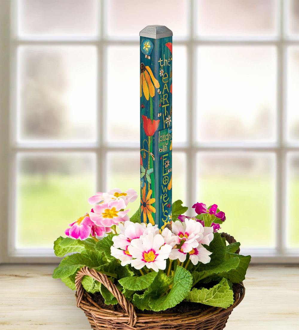 Studio M Art Pole shown next to hand to show 16-inch scale benefit