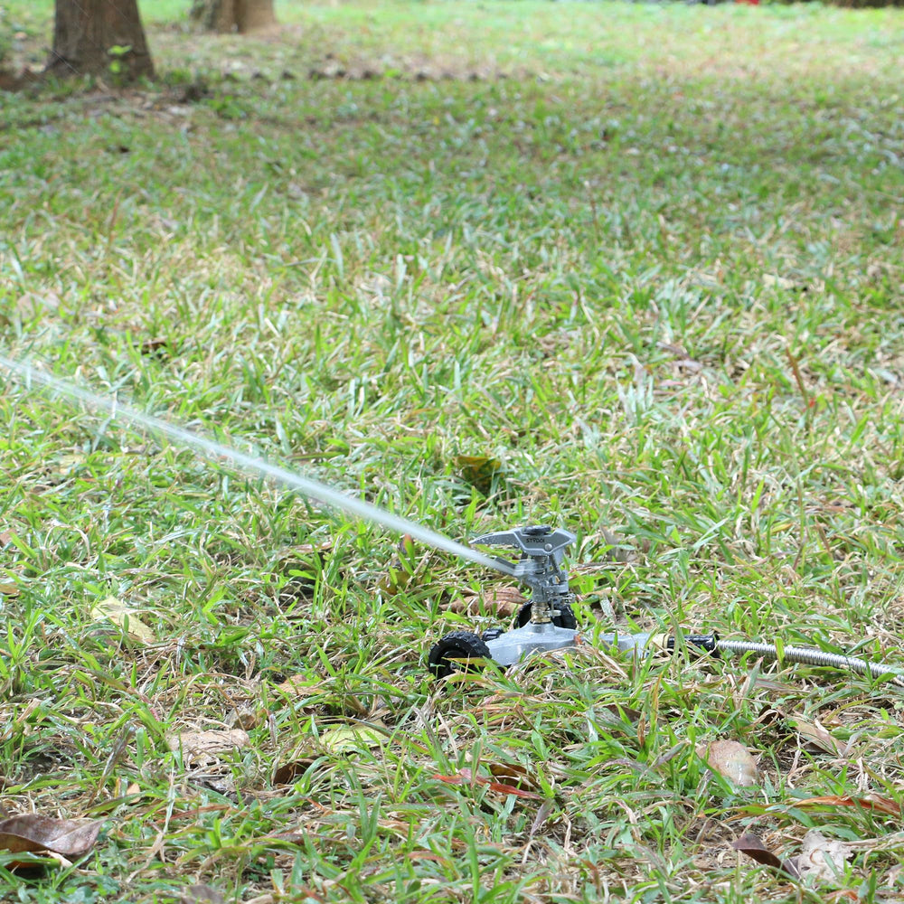 STYDDI sprinkler installed on lawn demonstrating even watering coverage benefit