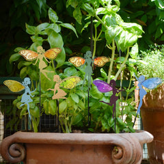 SUBOLO single fairy stake placed in a potted plant adding vertical interest