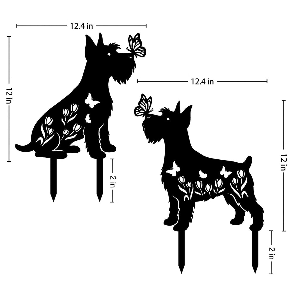 Subvise Miniature Schnauzer staked in garden bed adding charm to flowers