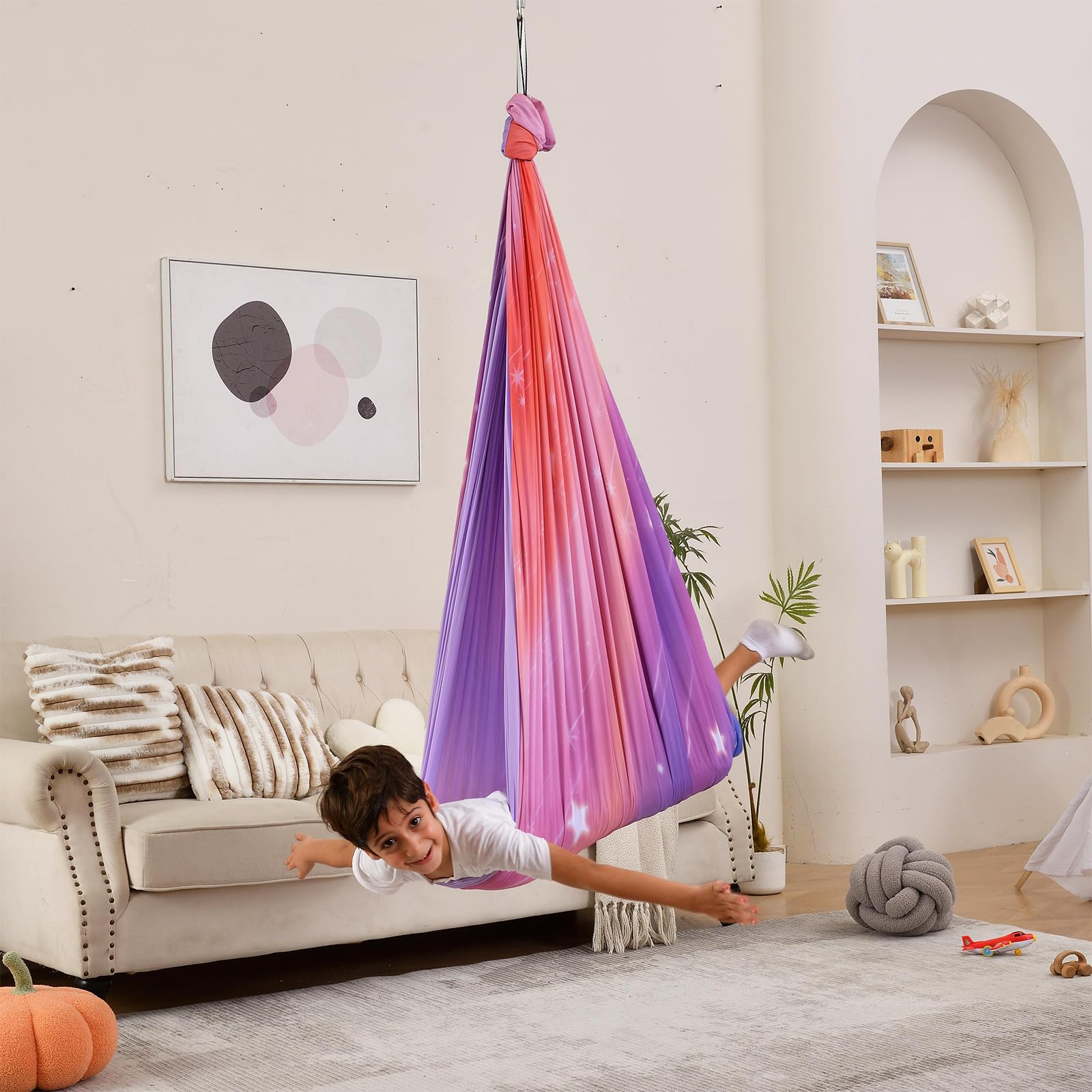 SUCHDECO swing in use with child relaxing showing soothing vestibular benefit