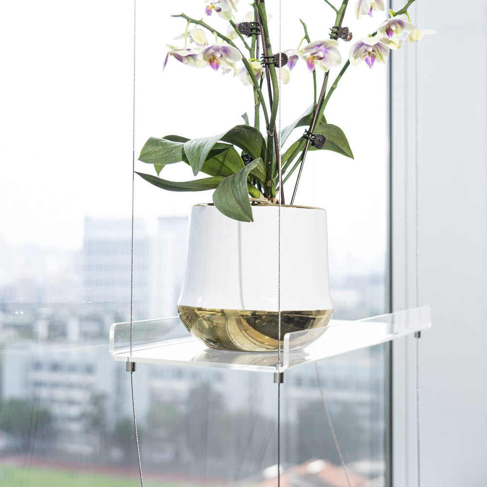 Sumerflos kitchen window arranged with herbs illustrating easy access and fresh-cooking benefit