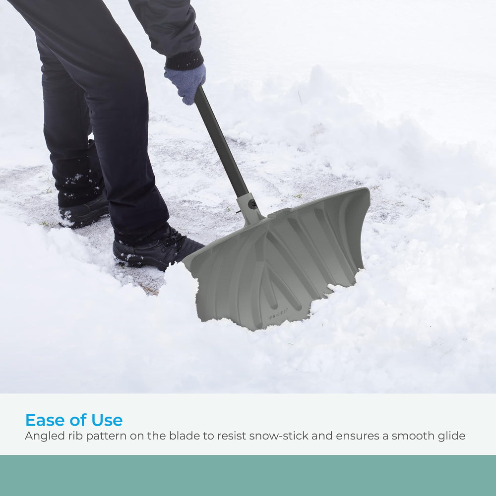 Suncast pusher in use on driveway clearing snow faster with less effort