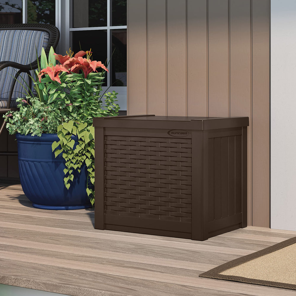 Suncast Java deck box used as a side table and extra seating benefit
