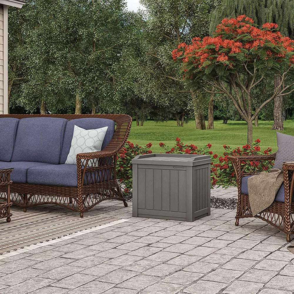 Suncast packed with towels and cushions shows practical poolside storage benefit
