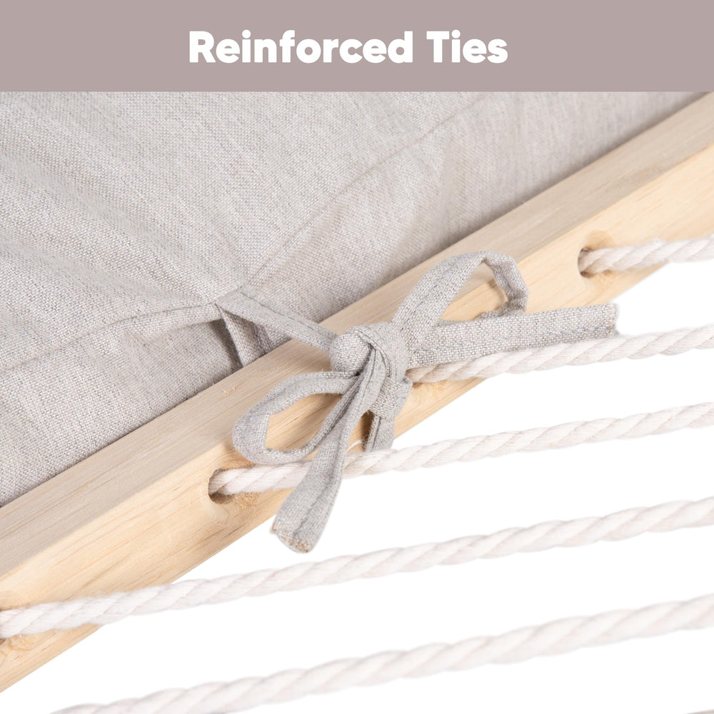 SUNCREAT pillow secured in a hammock outdoors offering stable lounging comfort