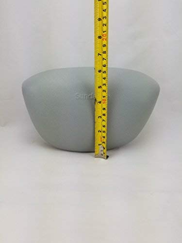 Sundance pillow held in hand illustrating size and scale for fit