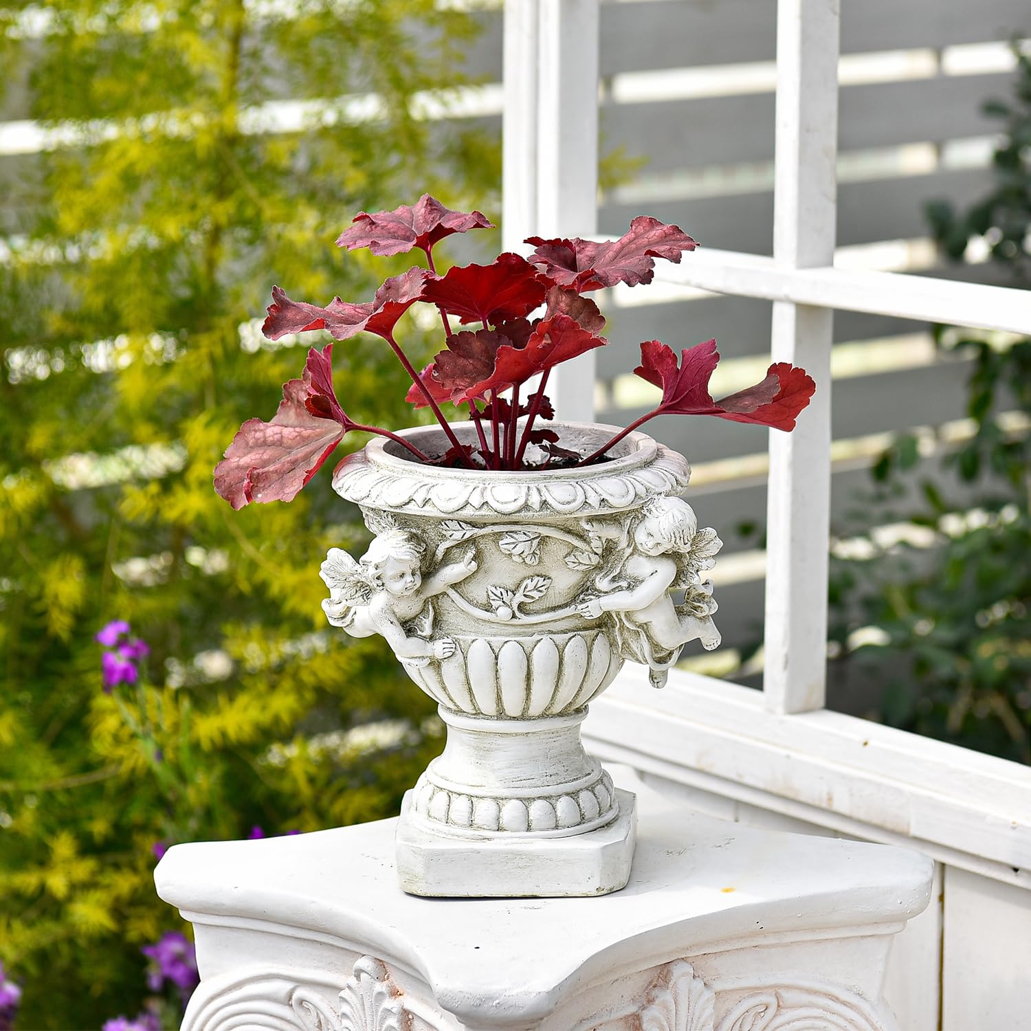 Sungmor cherub urn on a patio illustrating outdoor décor enhancement