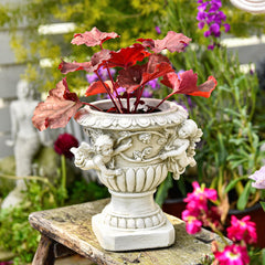 Sungmor cherub urn planted with succulents showing attractive display benefit