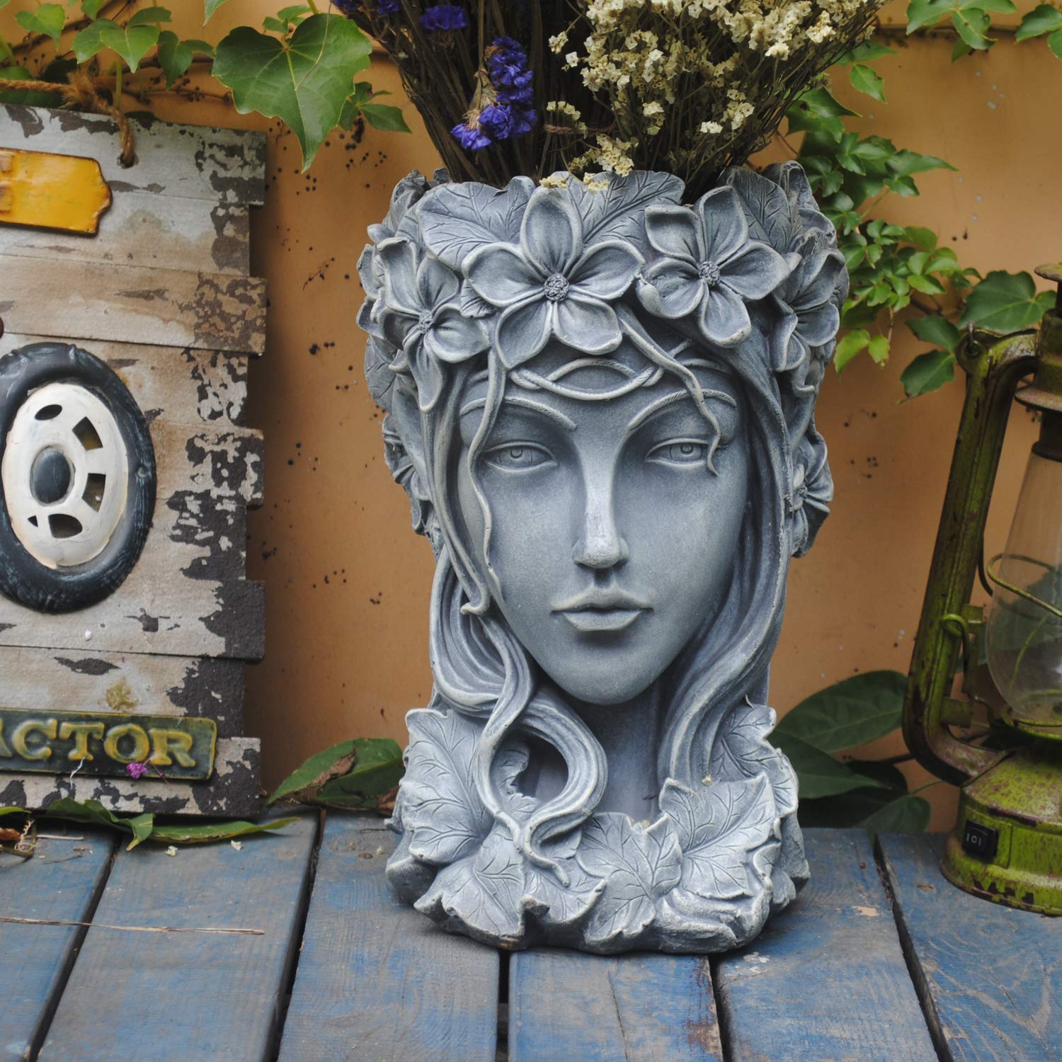 Sungmor goddess head planter front view showing sculptural face and wide planting bowl for display