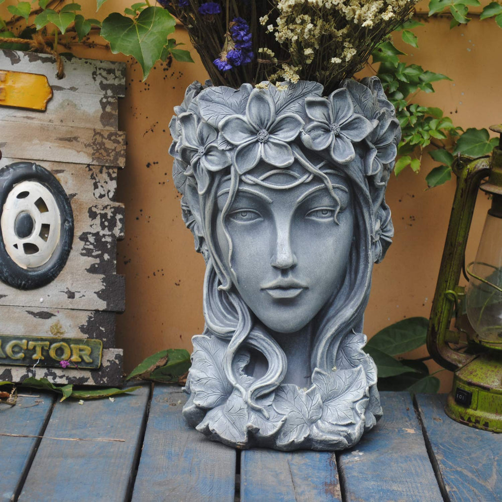 Sungmor goddess head planter front view showing sculptural face and wide planting bowl for display