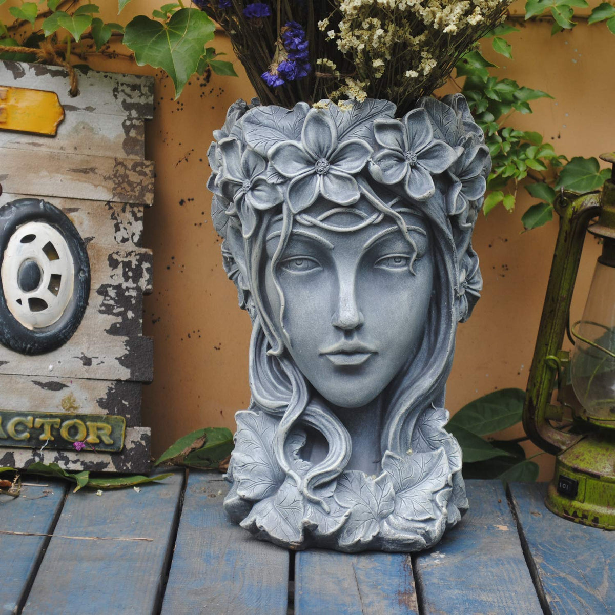 Sungmor goddess head planter front view showing sculptural face and wide planting bowl for display