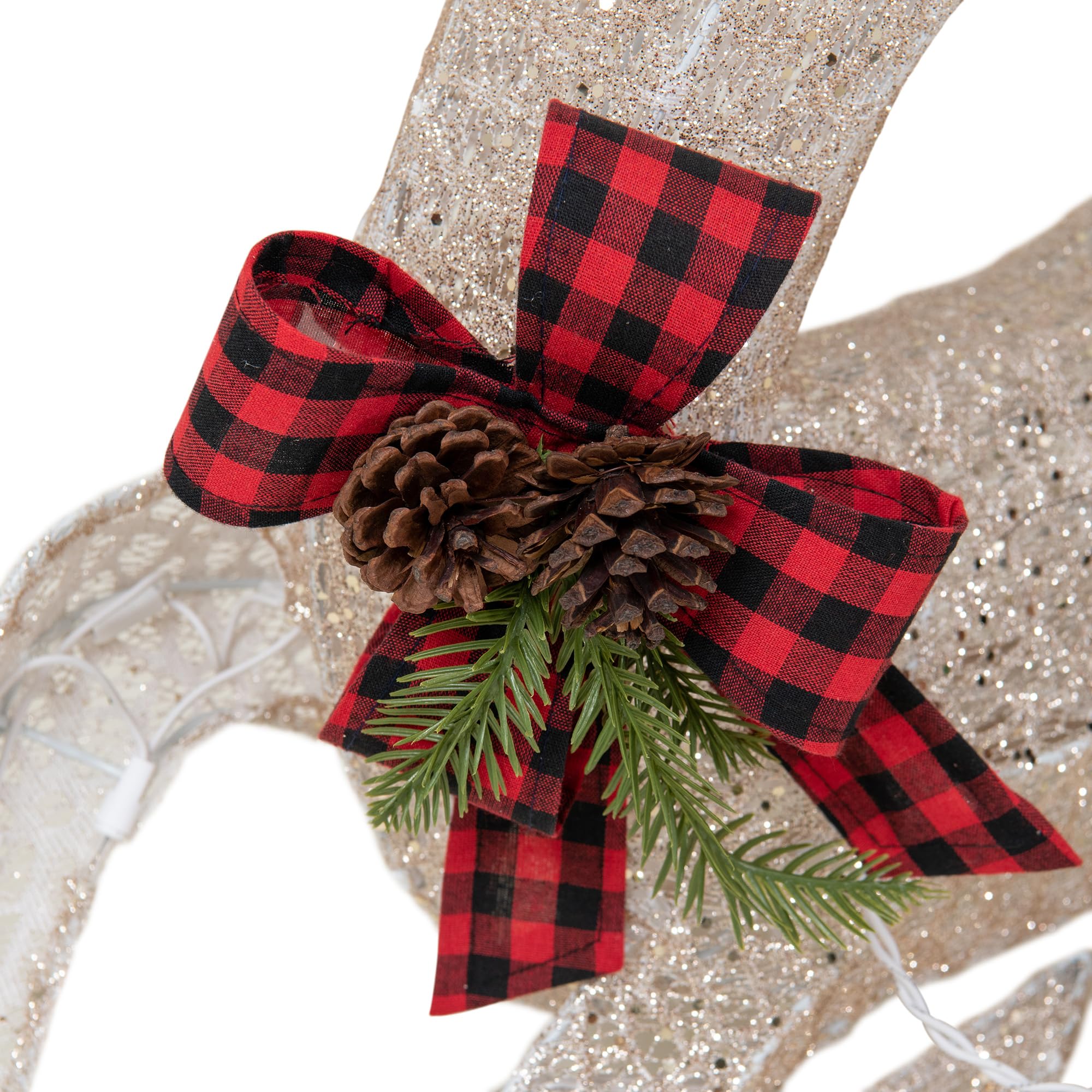 Sunjoy deer by fireplace indoors creating warm seasonal mantel display
