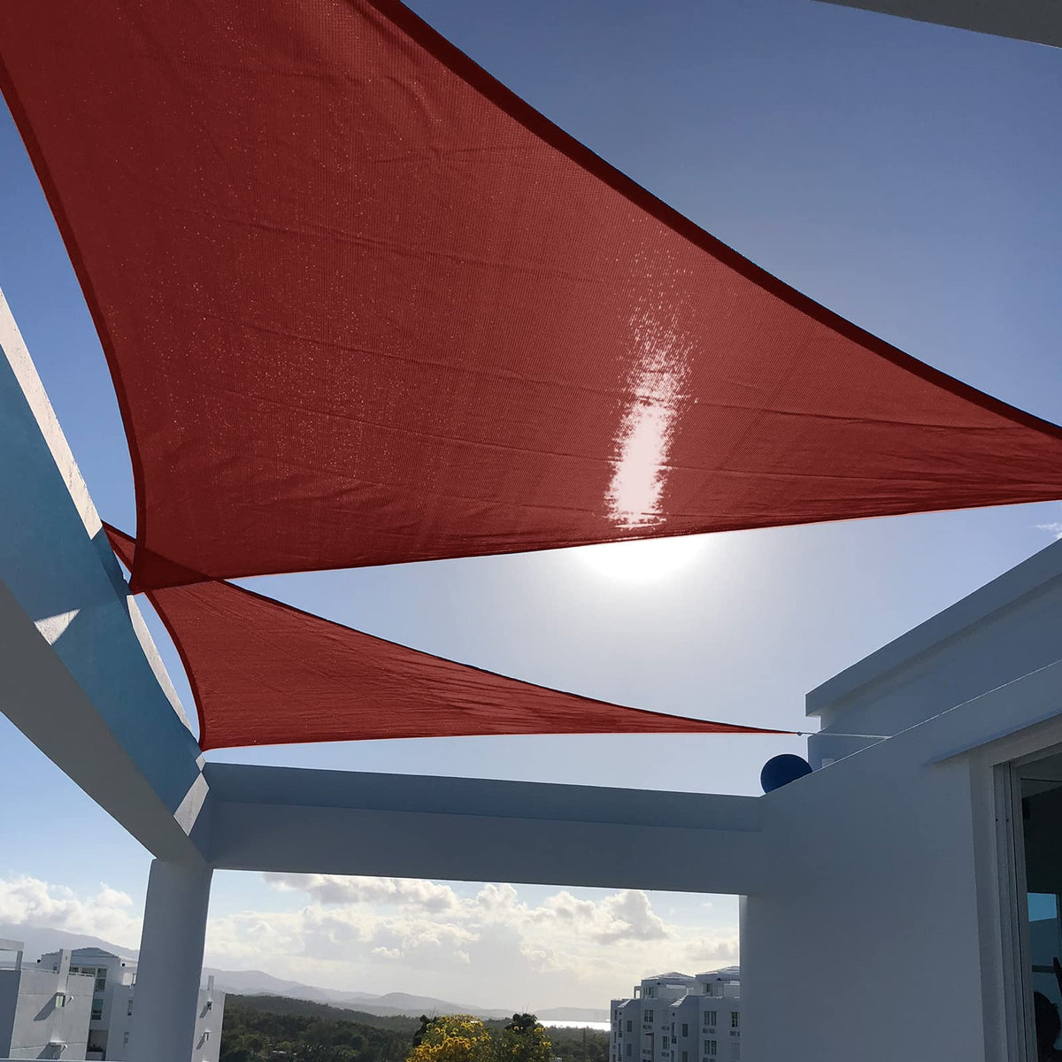 SUNNY GUARD front view shows full triangular canopy shielding patio