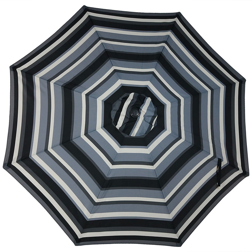 Sunnydaze umbrella beside table showing Catalina 9ft coverage and scale