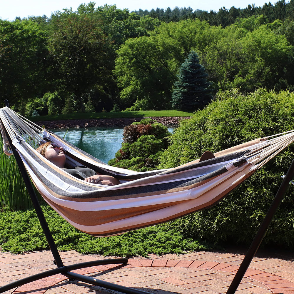 Sunnydaze hammock in use by two people showing relaxing benefit